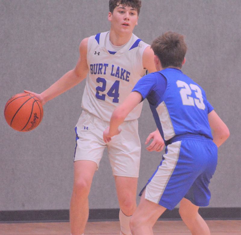 Burt Lake Northern Michigan Christian Academy senior guard Joshua Ferraiuolo (24) helped lift the Eagles to their first-ever district championship and an appearance in the regional final during his final campaign with the program.