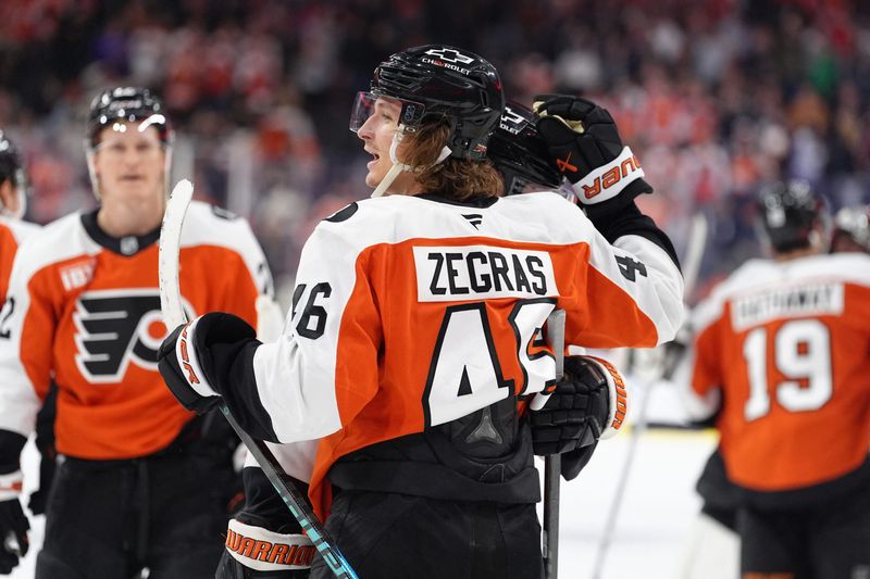 Flyers center Trevor Zegras (46) reacts after scoring the game-winning goal against the Stars in overtime at Xfinity Mobile Arena in Philadelphia on Sunday.