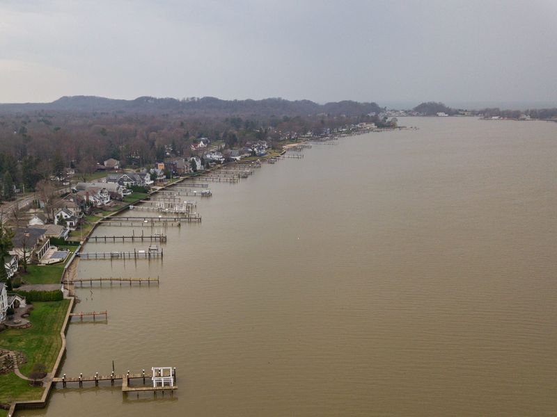 An aerial view of Lake Macatawa and the surrounding neighborhoods in Holland on Thursday, April 2.