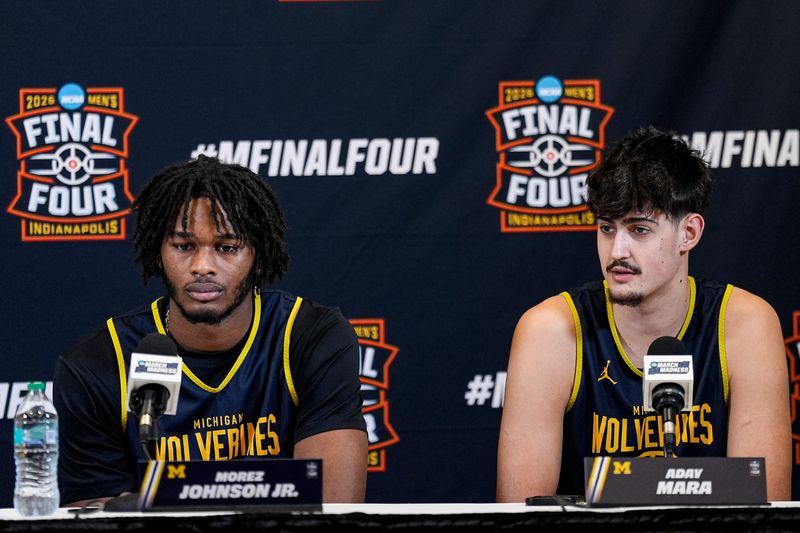 Michigan forward Morez Johnson Jr. (21), left, and center Aday Mara (15) answer questions at break out room ahead of practice at Lucas Oil Stadium in Indianapolis for practice on Friday, April 3, 2026.