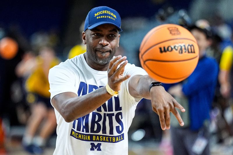Michigan assistant coach Mike Boynton Jr. practices at open practice at Lucas Oil Stadium in Indianapolis on Friday, April 3, 2026.