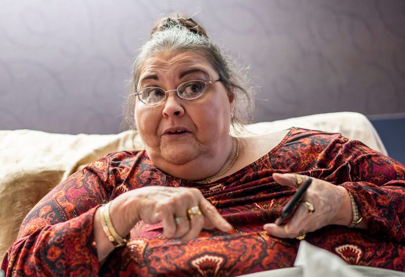 Nursing home resident Lori Youssef, 65, talks about a video camera her children gave her to monitor her room at Belle Fountain Nursing and Rehabilitation Center in Riverview on Wednesday, April 1, 2026.
