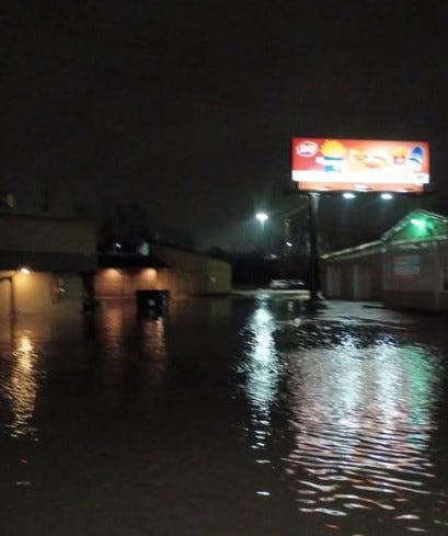 Rain pooled outside the Steakhouse Philly Bar & Grill, 3020 E. Kalamazoo St., in Lansing Township the morning of Saturday, April 4, 2026.