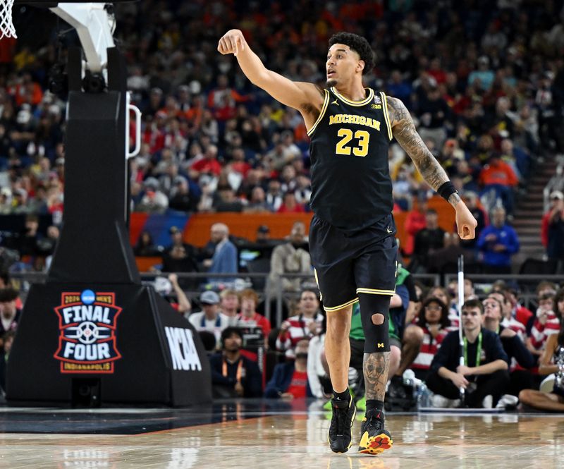 Michigan forward Yaxel Lendeborg (23) communicates with a teammate in the second half.