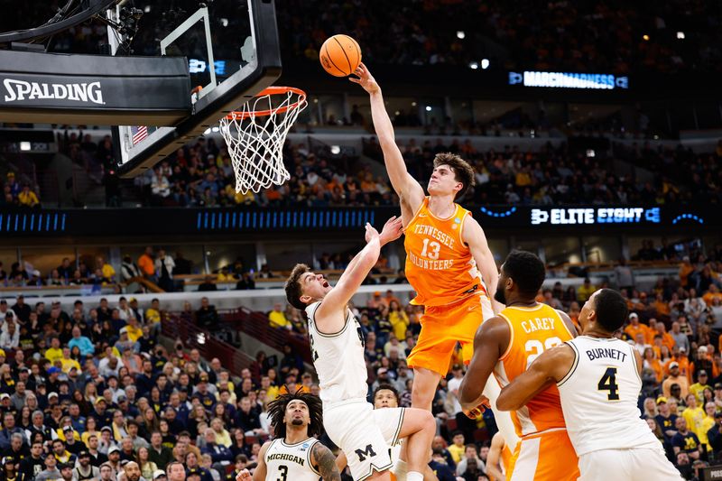 Mar 29, 2026; Chicago, IL, USA; Tennessee Volunteers forward J.P. Estrella (13) shoots in first half against the Michigan Wolverines during an Elite Eight game of the Midwest Regional of the men's 2026 NCAA Tournament at United Center. Mandatory Credit: Kamil Krzaczynski-Imagn Images