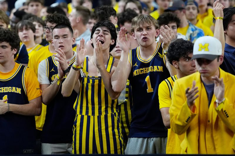 Michigan fans cheer during the second half of the NCAA national championship game at Lucas Oil Stadium in Indianapolis on Monday, April 6, 2026.