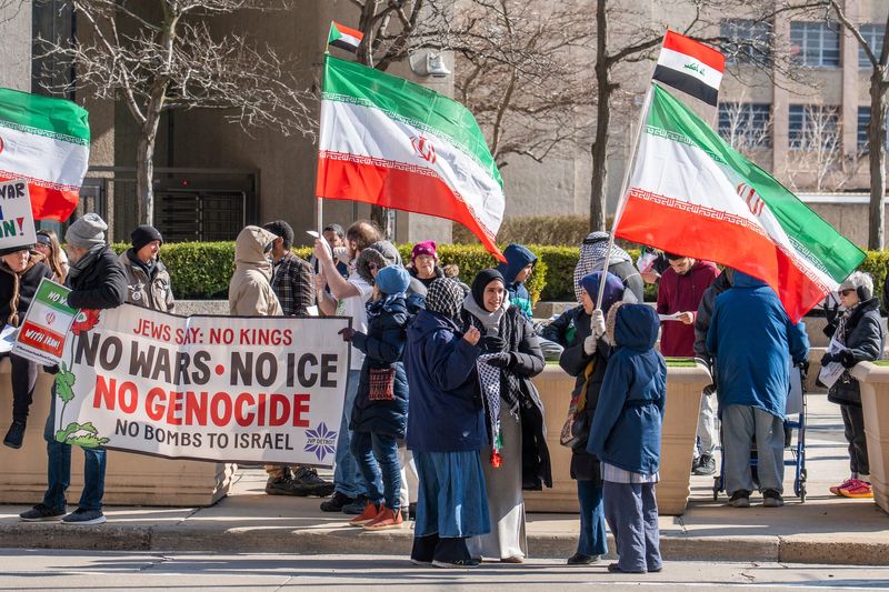 Protesters gather outside of the McNamara Federal Building in downtown Detroit on Tuesday, April 7, 2026, to protest against the U.S. war on Iran, Lebanon and Palestine.