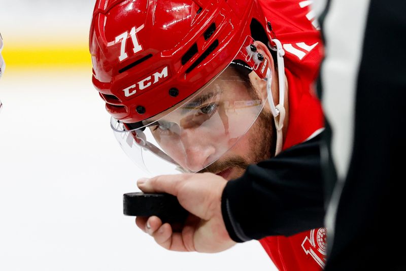 Detroit Red Wings center Dylan Larkin (71) gets set to face off Columbus Blue Jackets center Charlie Coyle (3) in the second period at Little Caesars Arena in Detroit on Tuesday, April 7, 2026.