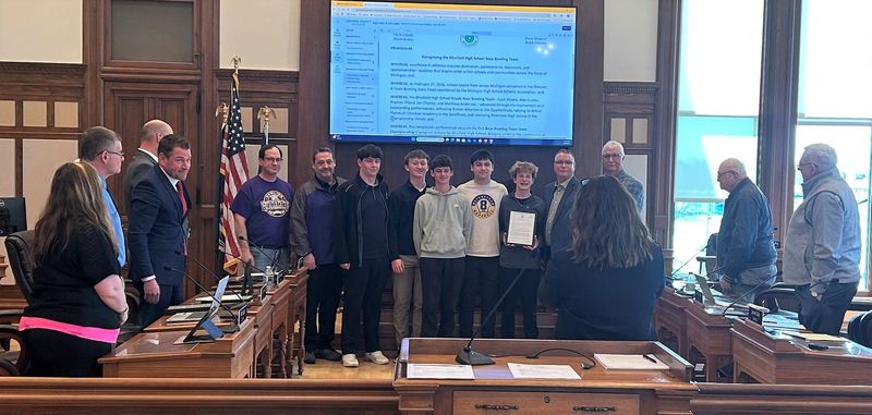 The Blissfield boys bowling team is honored at county chambers for a formal recognition ceremony led by District 7 Representative Kevon Martis after winning the program's first state title this season.