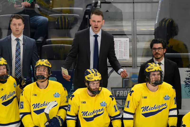 Michigan head coach Brandon Naurato is surprised by a non-call during the second period of the NCAA Men’s Ice Hockey semifinals game between the University of Michigan and University of Denver, at T-Mobile Arena, in Las Vegas, April 9, 2026.