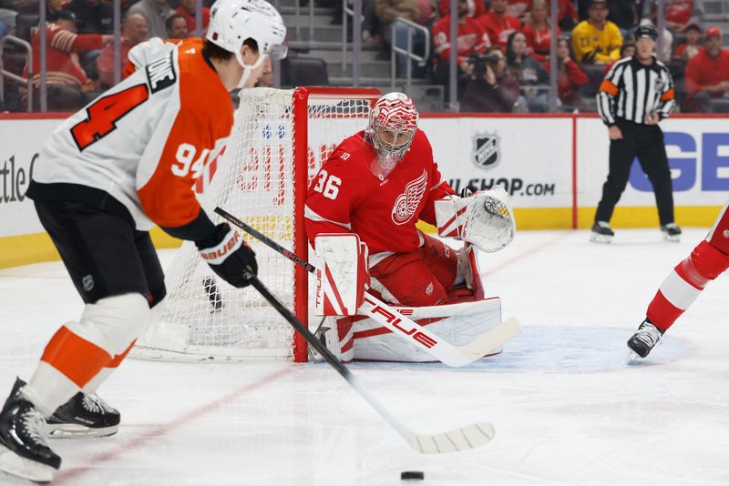Detroit Red Wings goaltender John Gibson follows the puck in the first period against the Philadelphia Flyers at Little Caesars Arena.