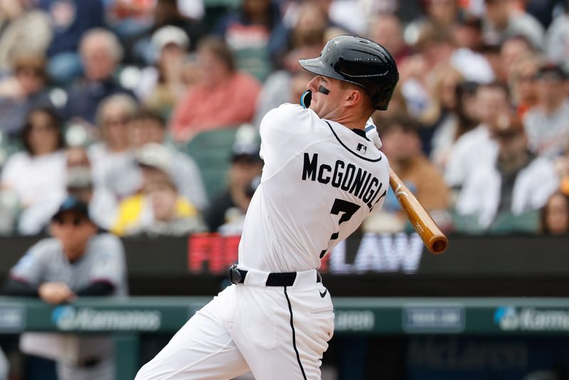Detroit Tigers shortstop Kevin McGonigle (7) hits a single in the third inning against the Miami Marlins at Comerica Park in Detroit on Sunday, April 12, 2026.