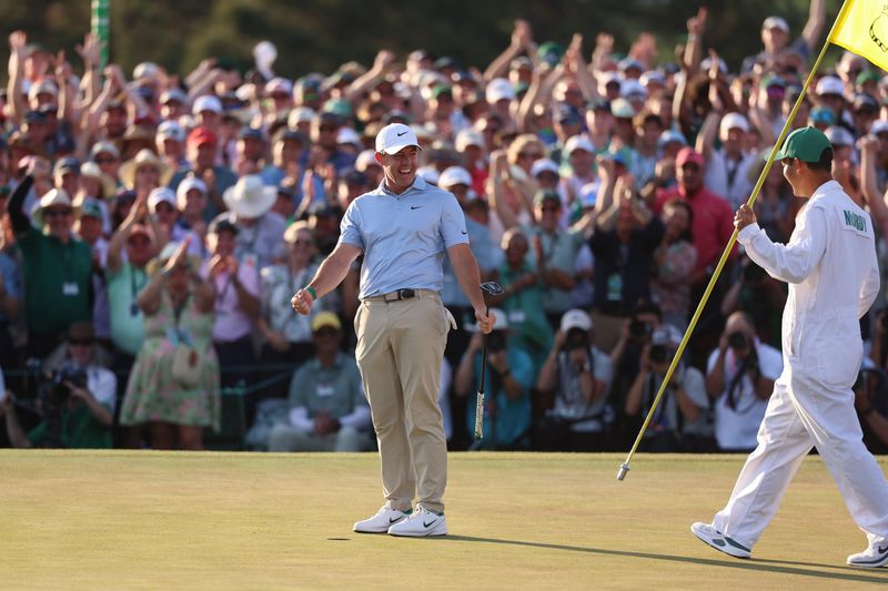 Rory McIlroy celebrates after winning the Masters Tournament at Augusta National Golf Club.