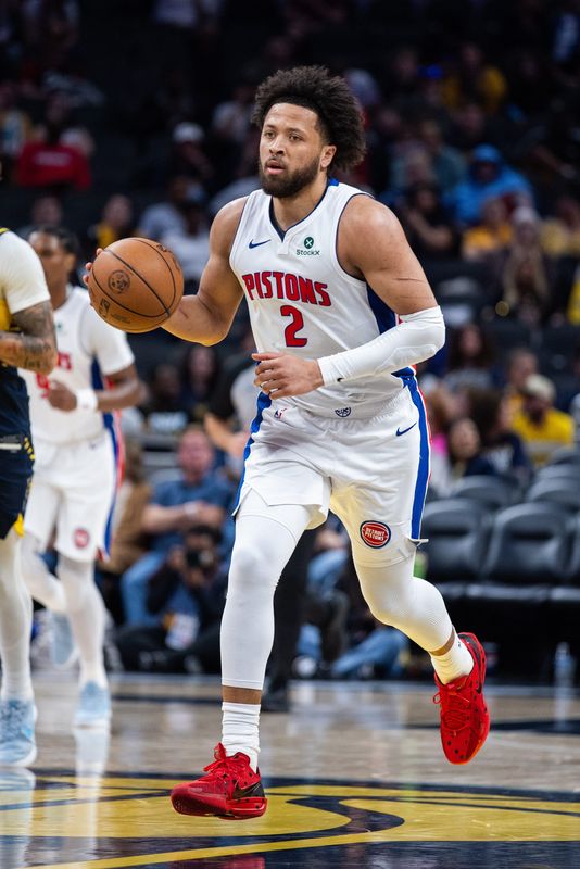 Detroit Pistons guard Cade Cunningham dribbles the ball in the second half against the Indiana Pacers at Gainbridge Fieldhouse, April 12, 2026 in Indianapolis.
