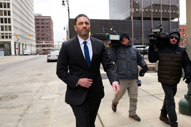 Matt Weiss, former offensive coordinator for the University of Michigan football program, leaves federal court in Detroit on March 24, 2025 after being accused of illegally accessing intimate images and videos from thousands of college athletes.