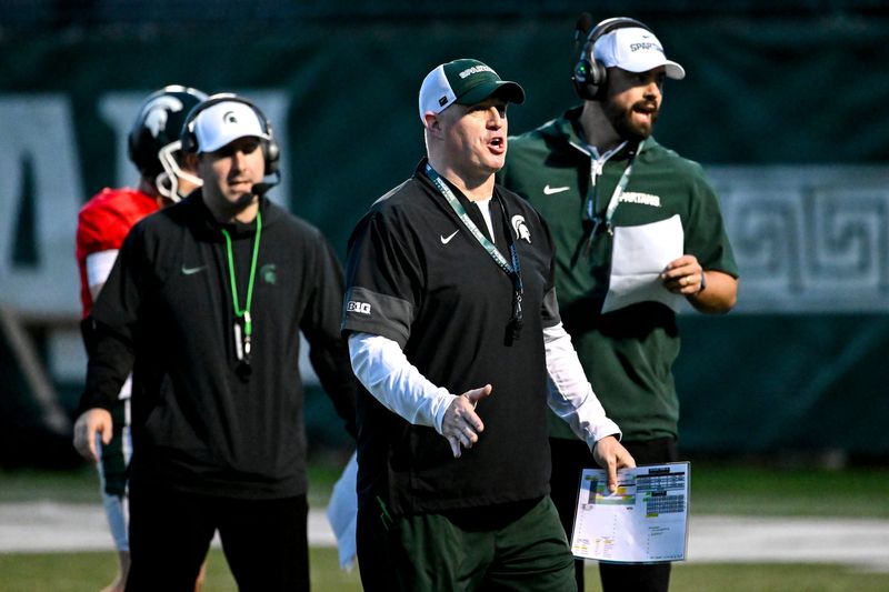 Michigan State head coach Pat Fitzgerald instructs players during spring football practice on Tuesday, April 14, 2026, in East Lansing.