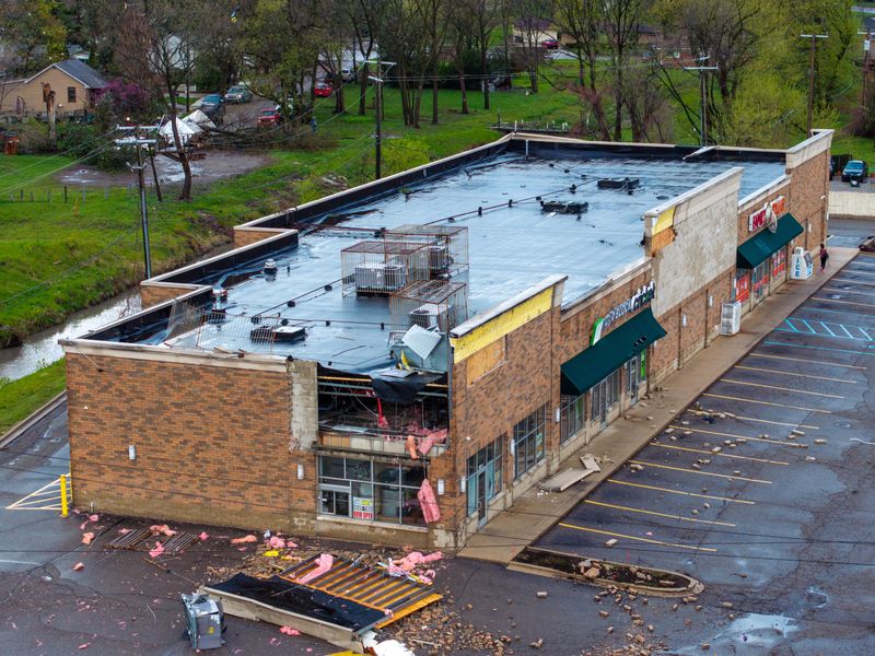 An overnight storm caused damage to a Subway restaurant and surrounding neighborhood Wed., April 15, 2026, at Dix Hwy and Outer Drive in Melvindale.