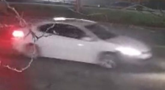 Farmington Hills police are seeking the driver of this white sedan, which they say struck a pedestrian on April 10 on Eight Mile Road, west of Middlebelt Road.