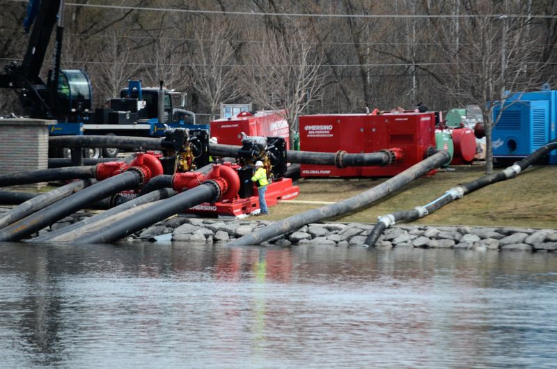 Workers monitor pumps above the Cheboygan Lock and Dam Complex on April 16, 2026.