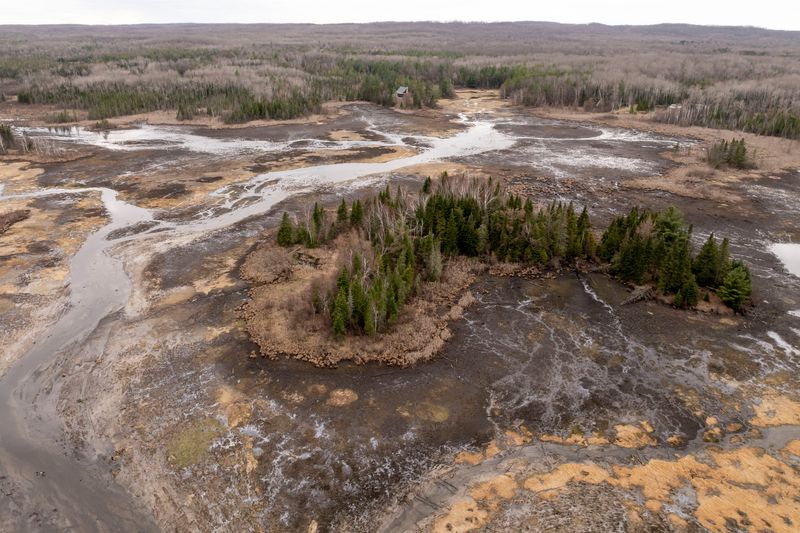 Buck’s Pond, in Barton City, April 16, 2026. The private dam at the east end of the water failed the night of April 13, emptying the contents of the pond.