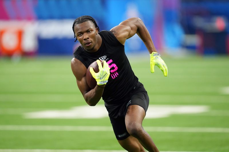 Feb 27, 2026; Indianapolis, IN, USA; Ohio State defensive back Davison Igbinosun (DB15) during the NFL Scouting Combine at Lucas Oil Stadium. Mandatory Credit: Kirby Lee-Imagn Images