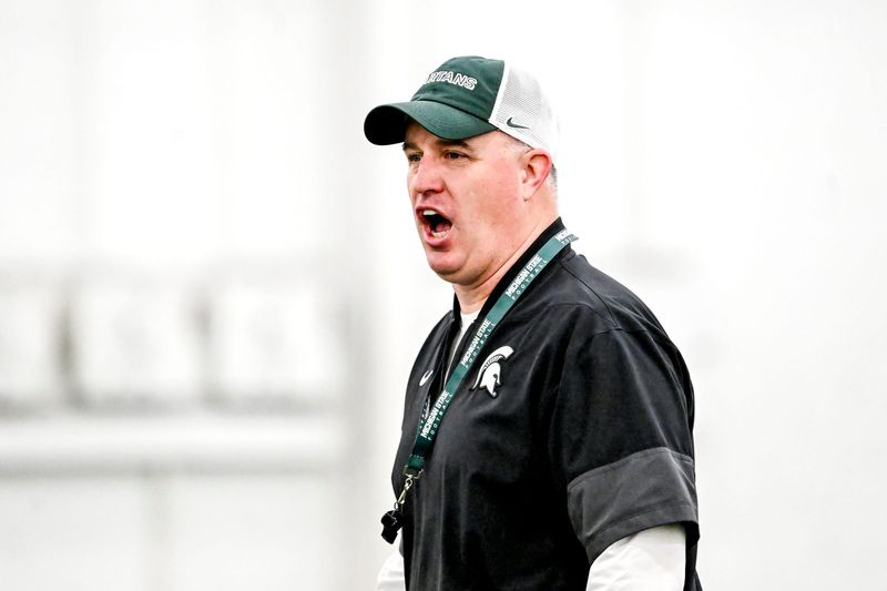 Michigan State's head coach Pat Fitzgerald calls out to players during spring football practice on Tuesday, April 14, 2026, in East Lansing.