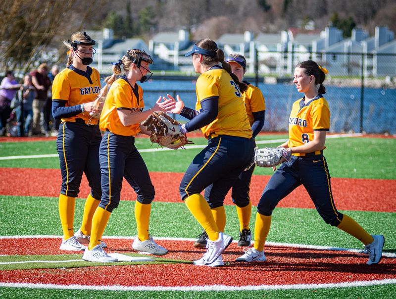 The Gaylord softball team celebrates an out during a doubleheader sweep of Boyne City on Friday, April 17.