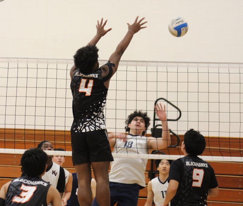 Fennville's Ja'Hari Grant goes up for a block.
