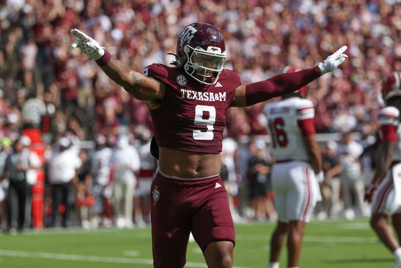 Texas A&M Aggies defensive end Cashius Howell (9) reacts after a defensive play during the first quarter against the South Carolina Gamecocks at Kyle Field.