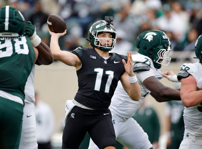 Michigan State quarterback Alessio Milivojevic throws during the MSU Football Spring Showcase.