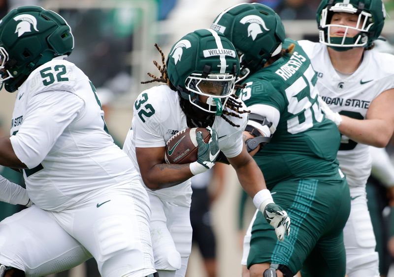 Kenneth Williams (32), a return man from Nebraska, is one of several special teams pieces the Spartans brought in through the transfer portal.