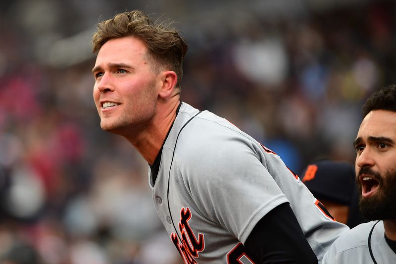 Detroit Tigers right fielder Kerry Carpenter watches a double hit by shortstop Javier Baez during the fourth inning against the Boston Red Sox at Fenway Park in Boston on Saturday, April 18, 2026.