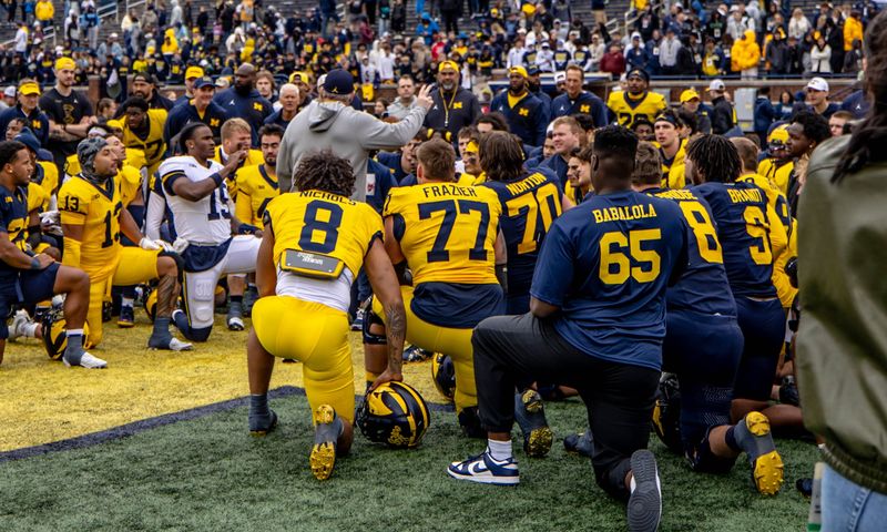Kyle Whittingham speaks to the Michigan football team after the spring game
