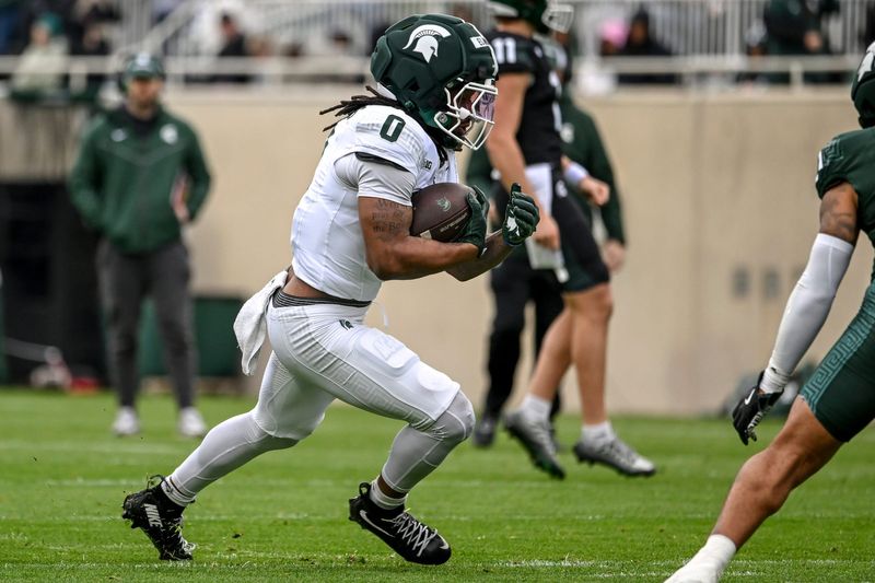 Michigan State's Cam Edwards runs the ball during the football Spring Showcase on Saturday, April 18, 2026, at Spartan Stadium in East Lansing.
