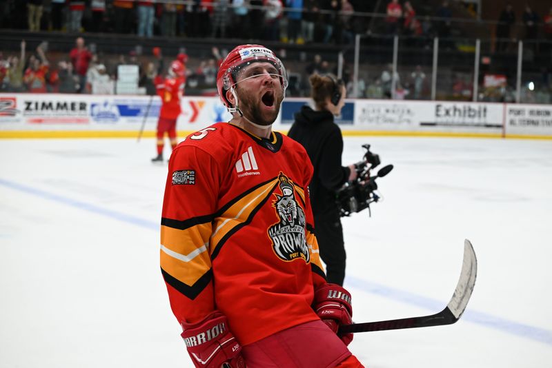 Port Huron Prowlers defenseman Alex Johnson celebrates after a 4-2 victory over the Blue Ridge Bobcats in Game 3 of the FPHL Commissioner's Cup quarterfinals at McMorran Arena in Port Huron on Saturday, April 18.