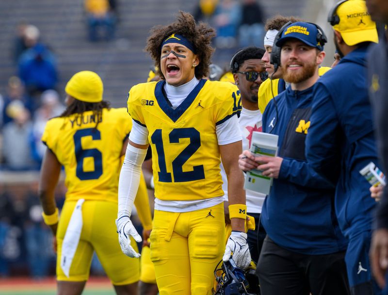 Freshman Salesi Moa (12) is one of the new additions in Michigan football's wide receiver room this season.