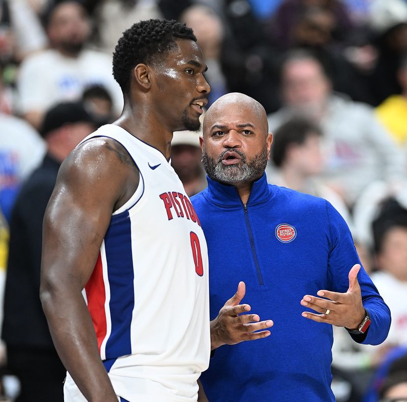 Detroit Pistons Head Coach J.B. Bickerstaff talks to Detroit Pistons center Jalen Duren (0) in the first half at Little Caesars Arena on Sunday, April 19, 2026, in Detroit.