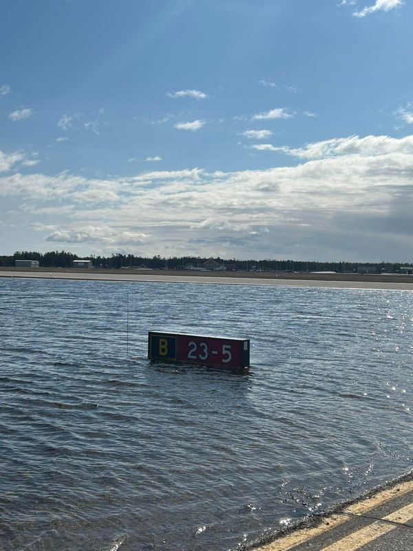 Flooding at the Pellston Regional Airport is shown.