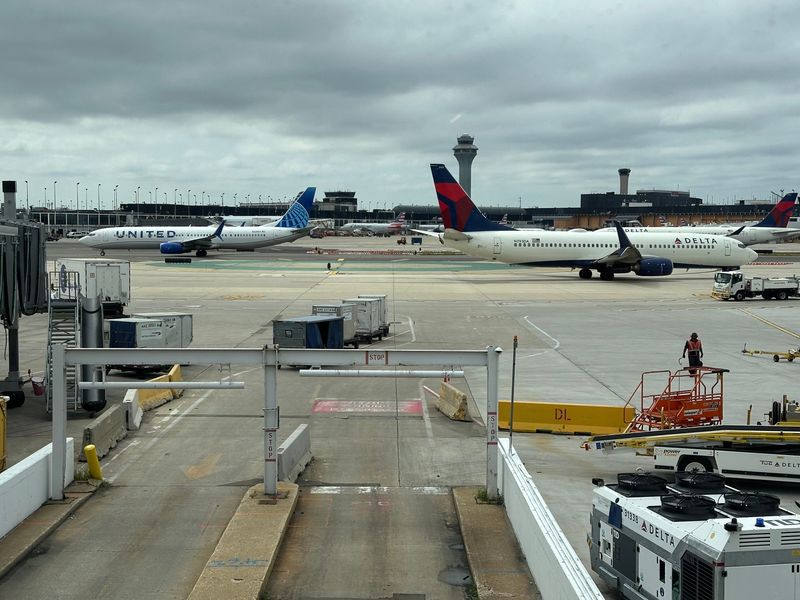 Delta Air Lines and United Airlines planes at Chicago O'Hare International Airport.