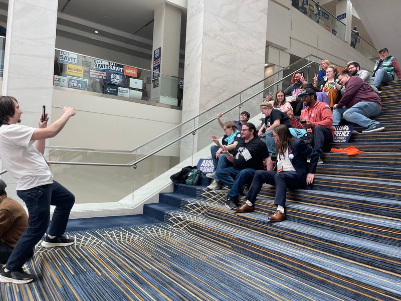 Michigan Democrats pose for a group photo at Huntington Place in downtown Detroit on April 19, 2026, during the party's statewide candidate endorsement convention.
