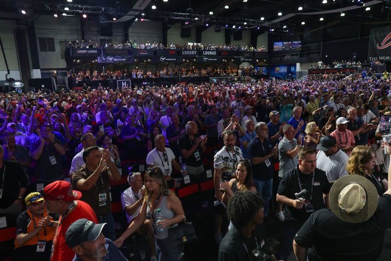 The crowd at the Barrett-Jackson Palm Beach auction on April 18, 2026, giving a standing ovation to Medal of Honor recipients.