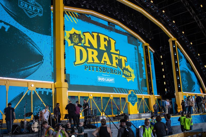 A side profile view of the center of the NFL Draft Stage, with the backdrop of the stage featuring a depiction of the Fort Pitt Bridge Wednesday, April 22, 2026 from outside Acrisure Stadium in Pittsburgh, Pa.