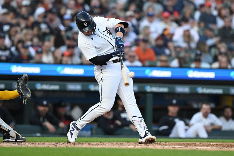 Apr 22, 2026; Detroit, Michigan, USA; Detroit Tigers first baseman Spencer Torkelson (20) hits a two-run home run against the Milwaukee Brewers in the fourth inning at Comerica Park. Mandatory Credit: Lon Horwedel-Imagn Images