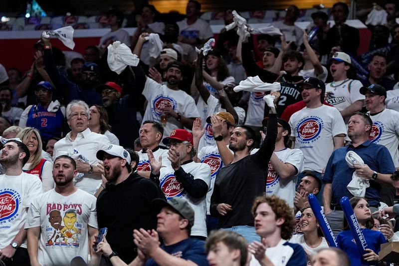 Detroit Pistons fans cheer during the second half of Game 2 against the Orlando Magic in the first round of the NBA playoffs at Little Caesars Arena in Detroit on Wednesday, April 22, 2026.