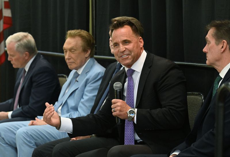 Michigan candidate for governor Democrat Chris Swanson, with Republicans Mike Cox, left, Perry Johnson and Aric Nesbitt and Ralph Rebandt, right, debate at the annual Michigan Press Association meeting in East Lansing, Michigan on April 23, 2026.