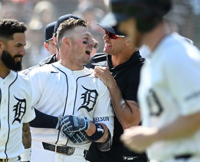 The Tigers’ Spencer Torkelson, left, reacts with pitcher Jack Flaherty, right, after Torkelson’s walk-off home run defeated the Milwaukee Brewers on Thursday.