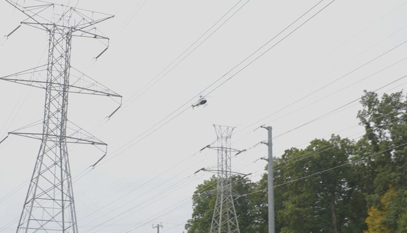 A helicopter patrols the grid over Pontiac, Michigan.