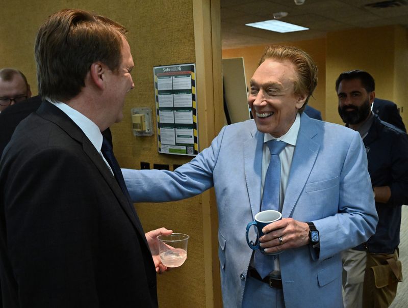 Michigan candidates for governor republicans Aric Nesbitt and Perry Johnson arrive at the annual Michigan Press Association meeting in East Lansing, Michigan on April 23, 2026.