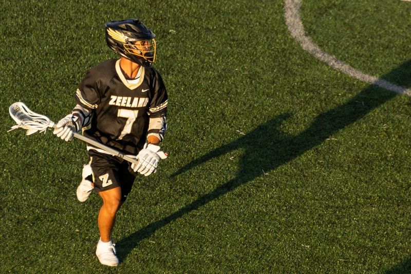Zeeland's Niko Moungkhoun looks to attach the West Ottawa net on Thursday, April 23.