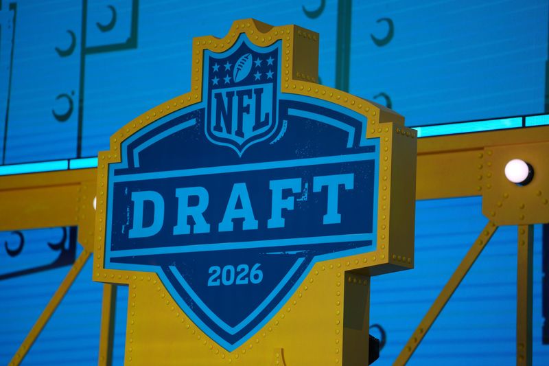 The 2026 NFL Draft logo on the theater stage at Acrisure Stadium.